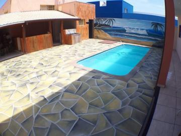 Sobrado junto com Barracão Comercial contendo 100m² e sobrado 144m², total de 244m² de área construída com piscina.